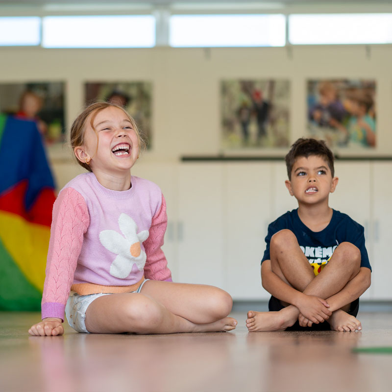 kids laughing in the hall